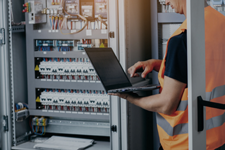 Electrician testing building automations